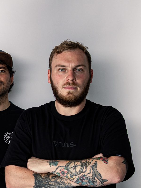 Korbi — Bass / Backing Vocals